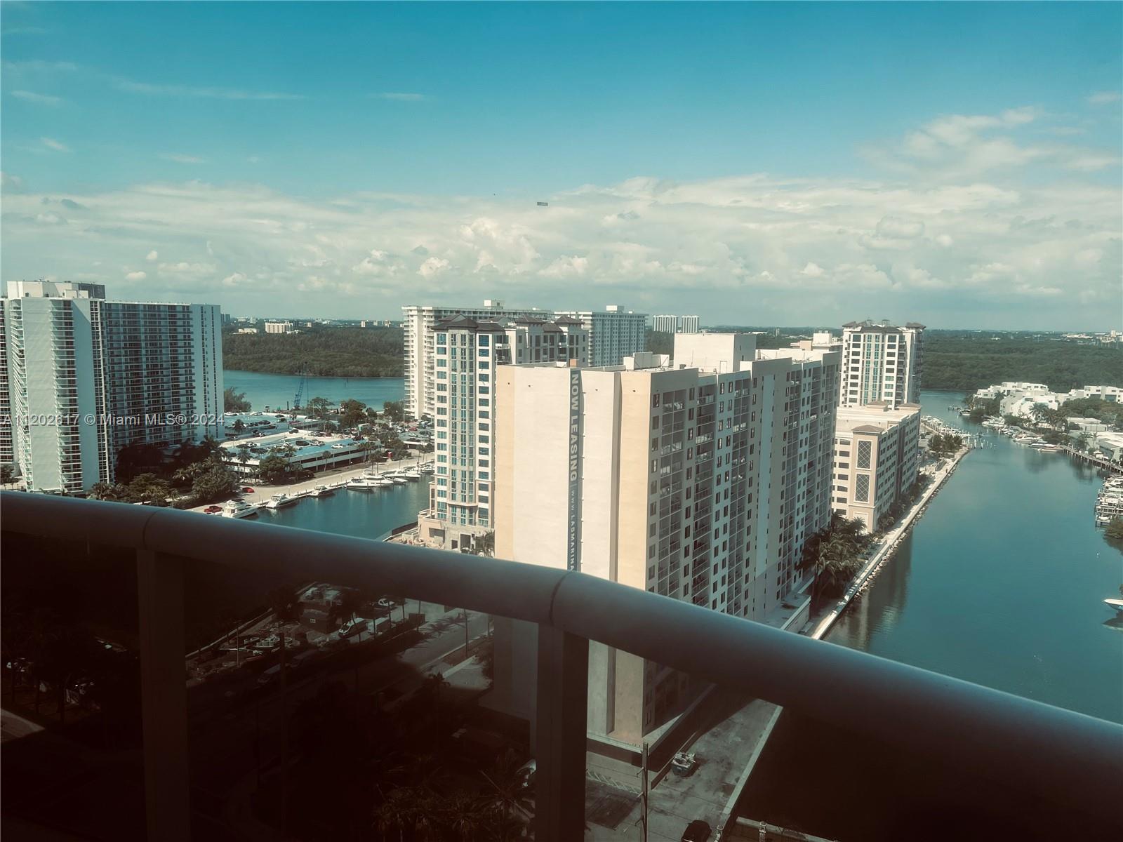 a view of a city from a balcony