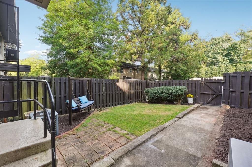 a view of a backyard with a patio