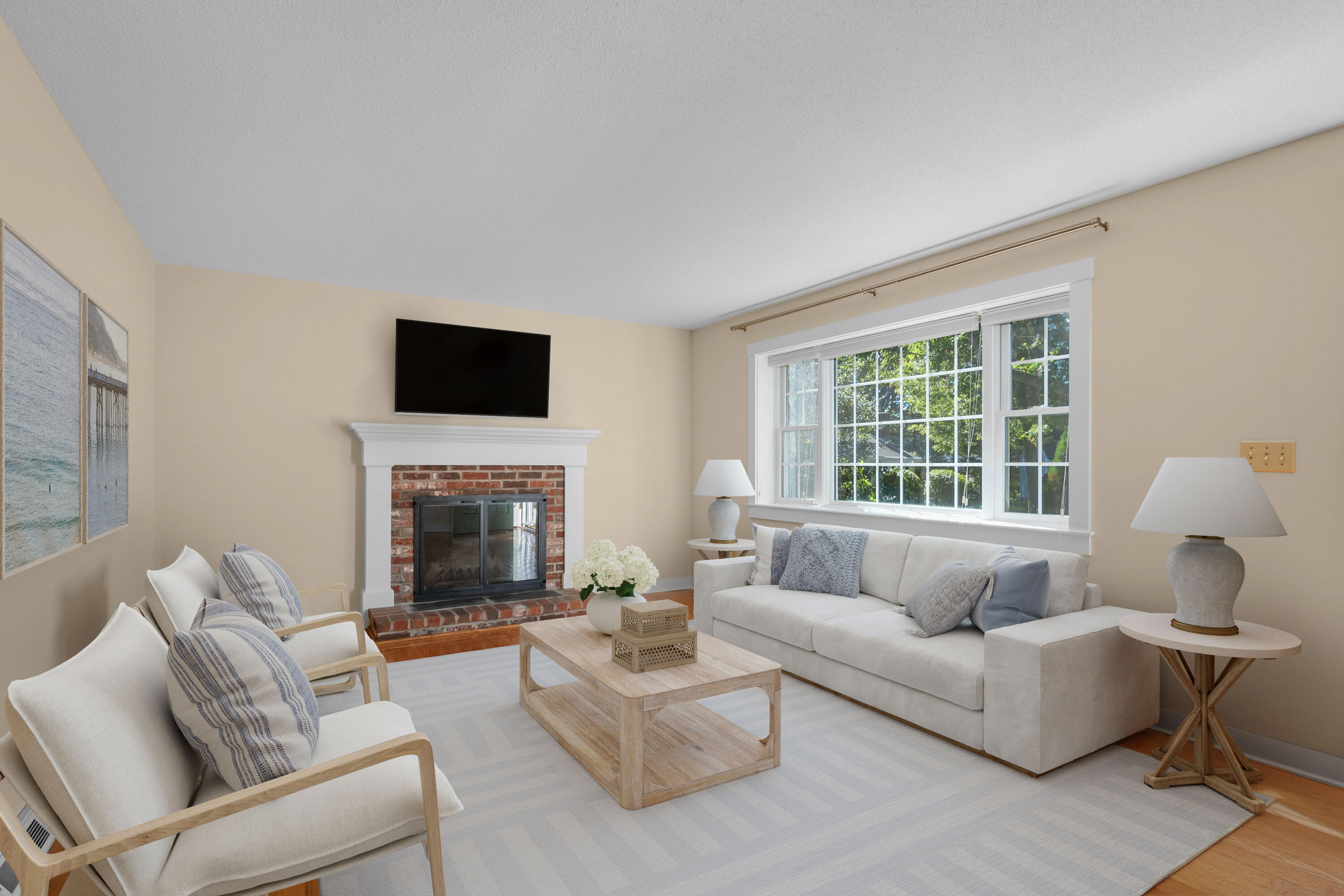 a living room with furniture a fireplace and a flat screen tv