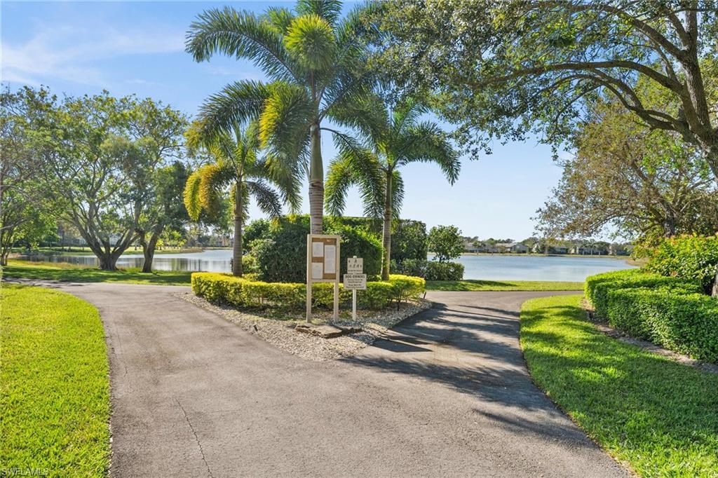 Surrounding community featuring a water view