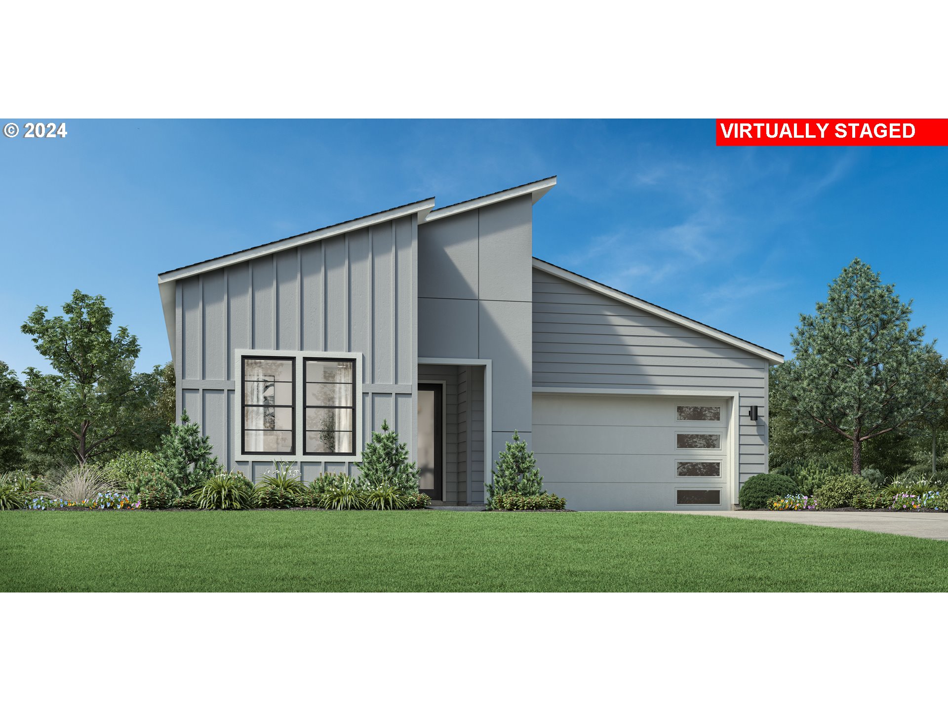 a front view of a house with a garage