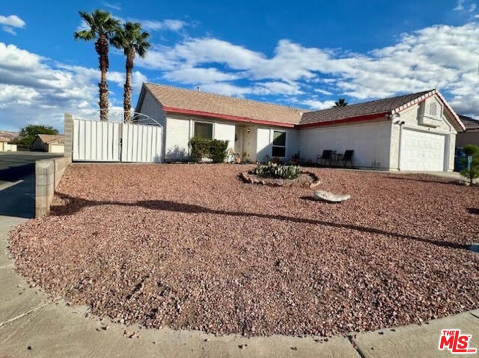 a house view with a backyard space