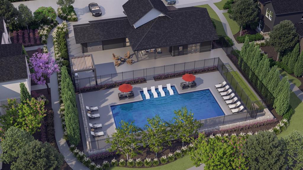 an aerial view of a house deck and garden