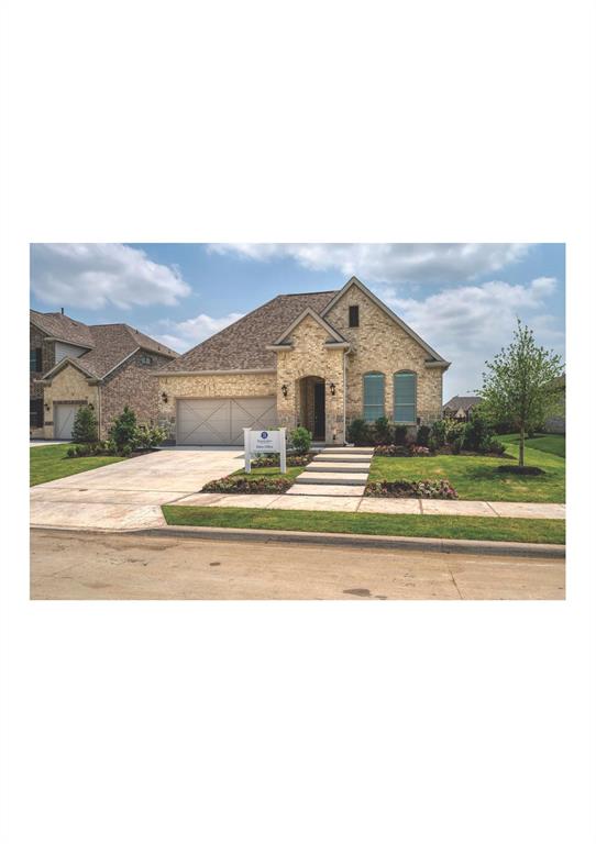 a view of a house and a yard