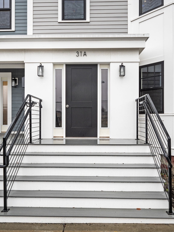 a view of entryway with a front door