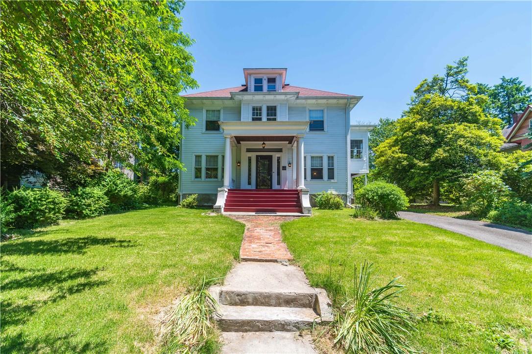 View of front of house with a front lawn