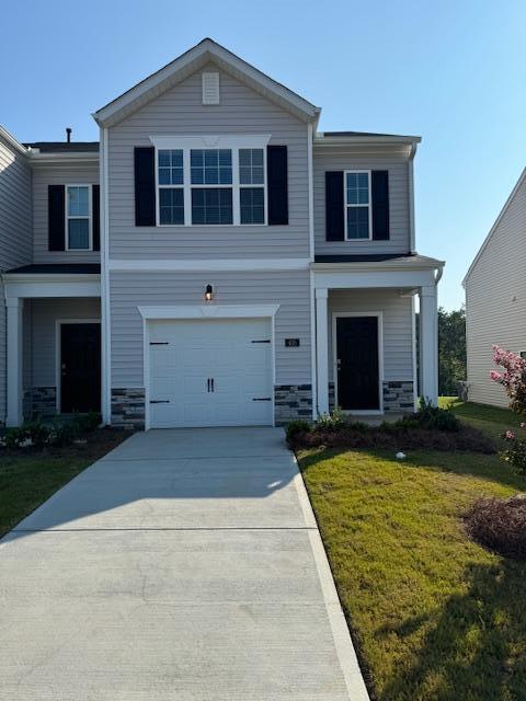 a front view of a house with yard