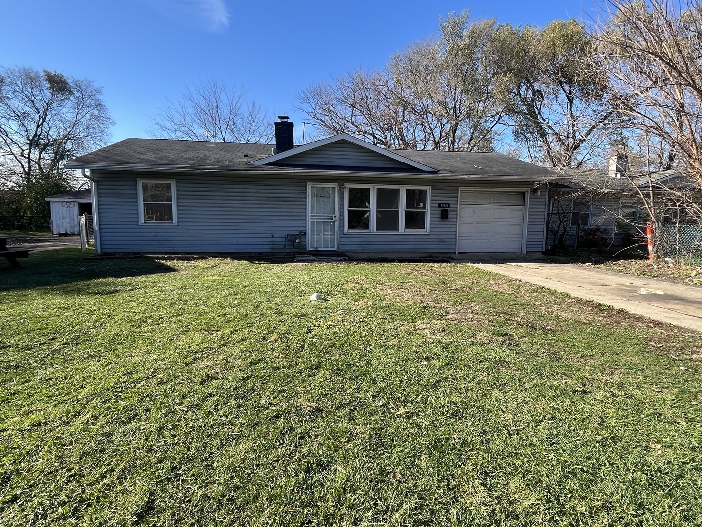 a front view of a house with yard