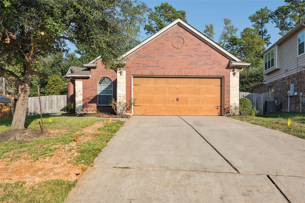 a front view of house with garage