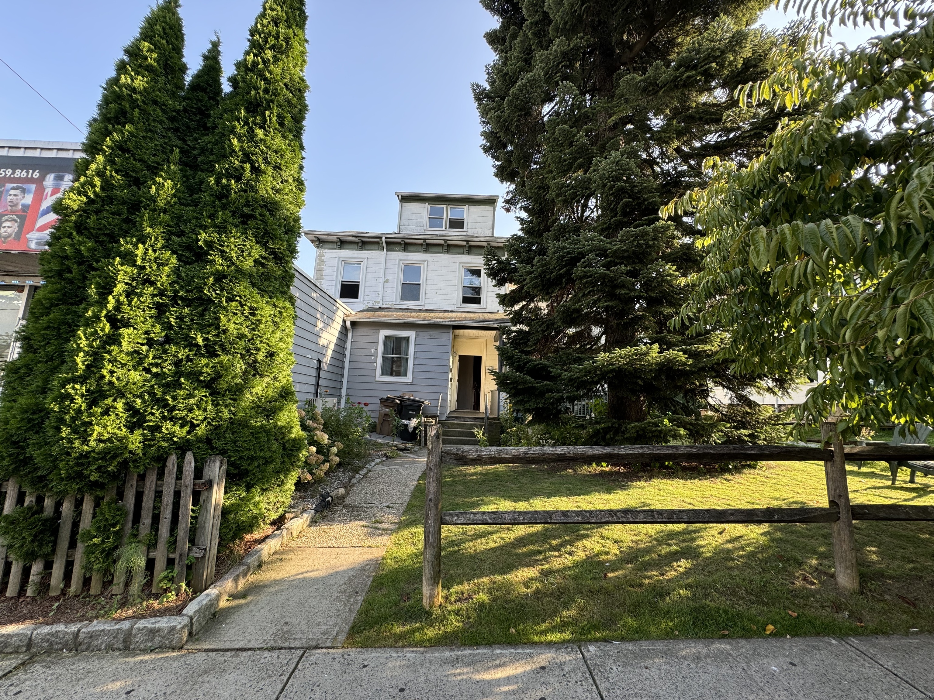 a view of a house with swimming pool