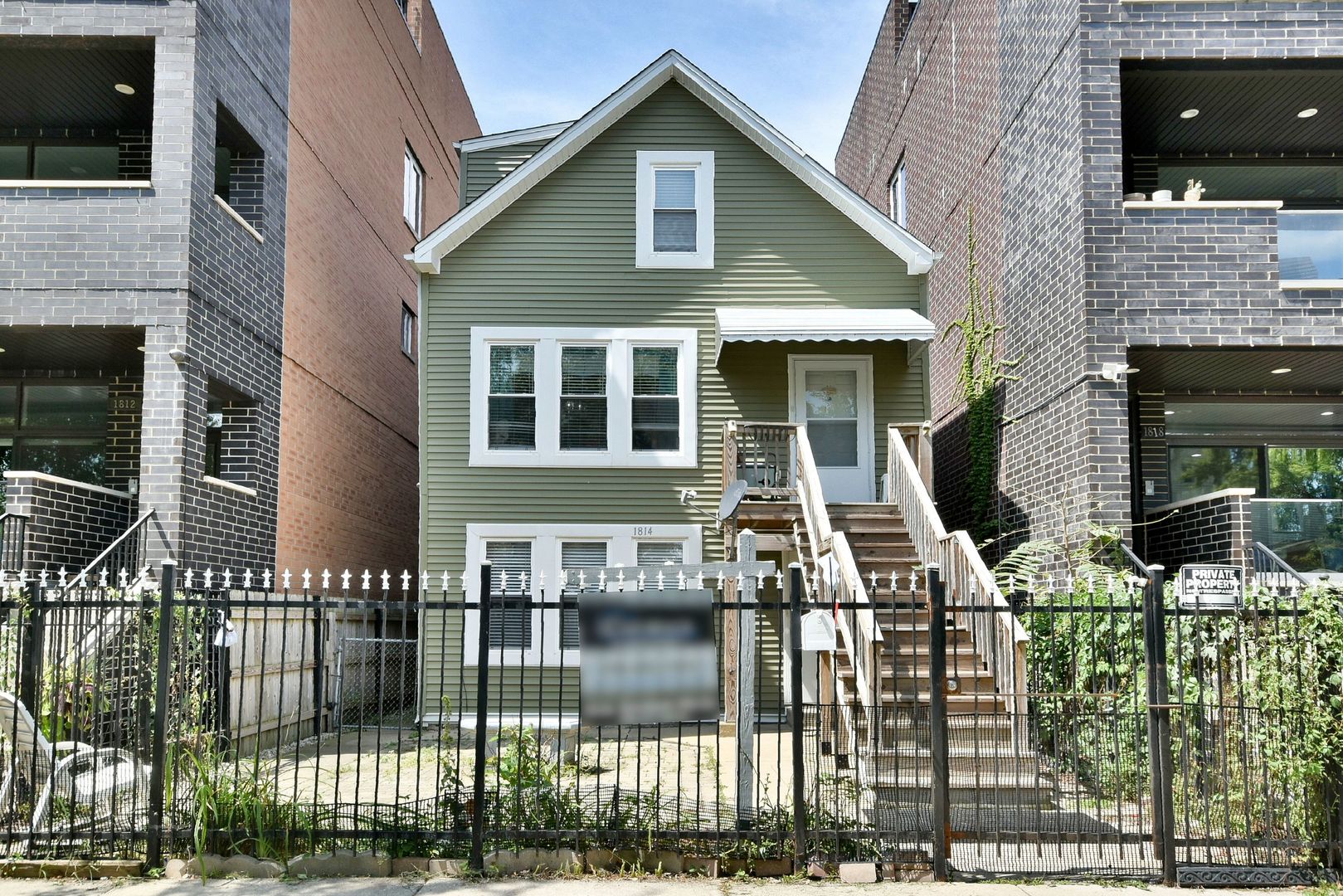 a front view of a house with parking