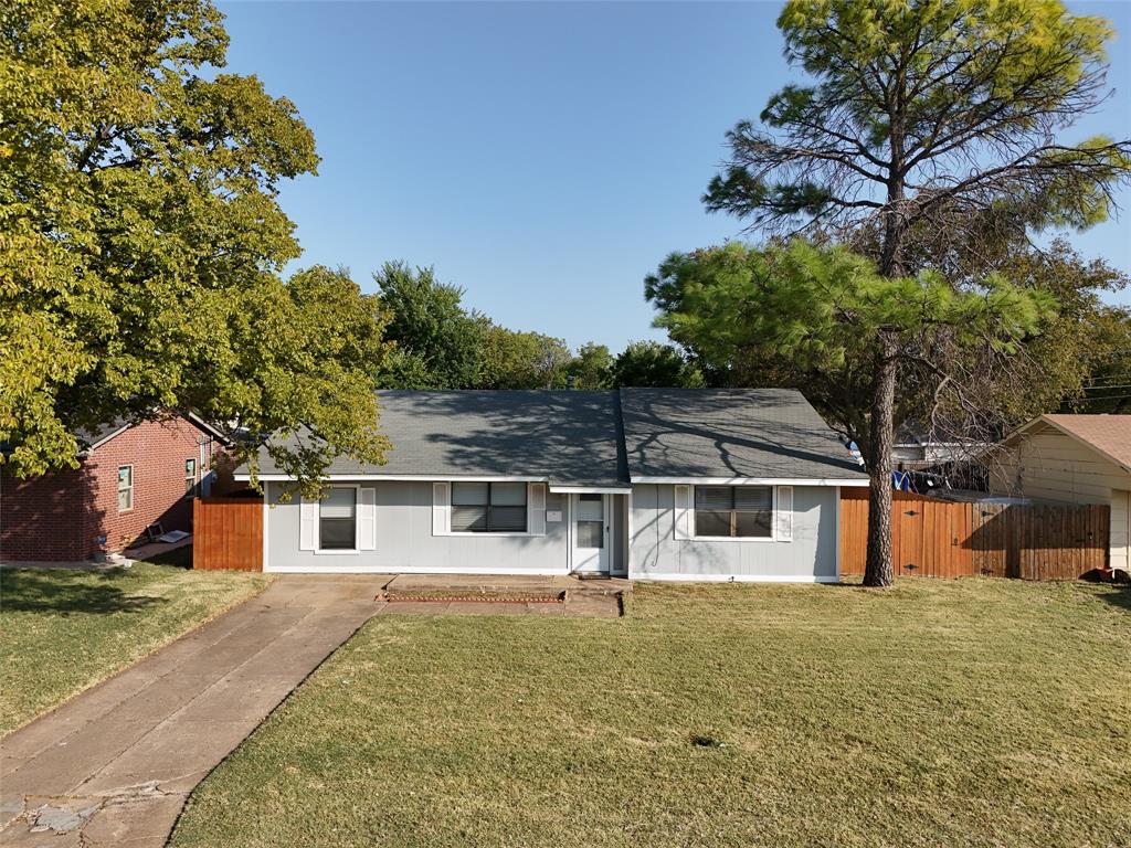 front view of a house with a yard