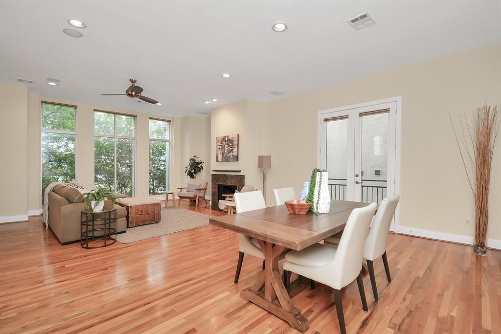 a dining room with furniture window wooden floor