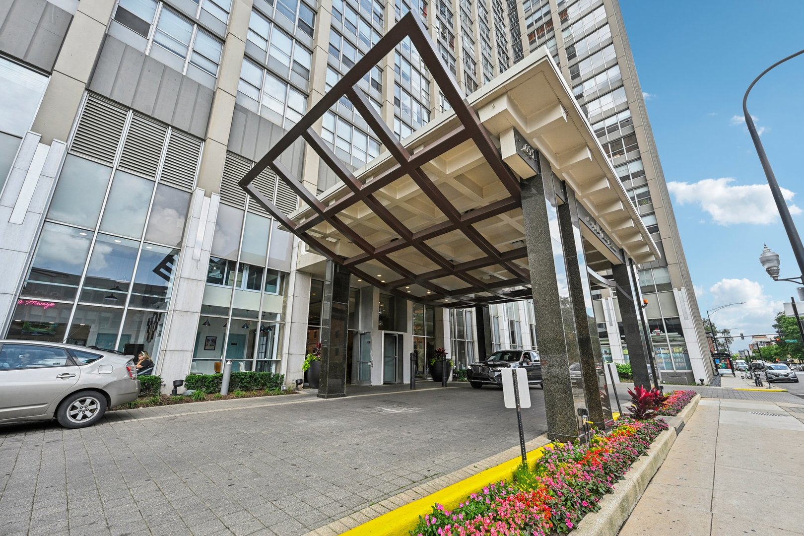 a view of a car park in front of a building