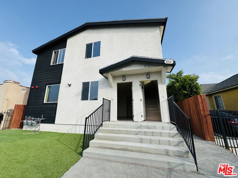 a front view of house with yard