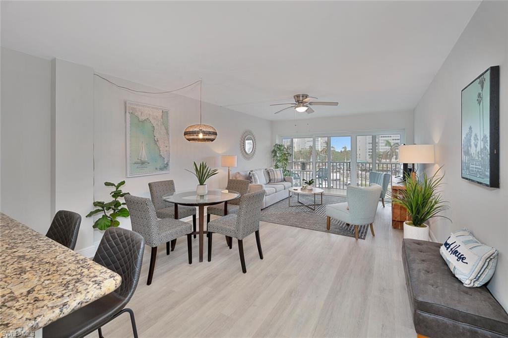 a living room with furniture and a table