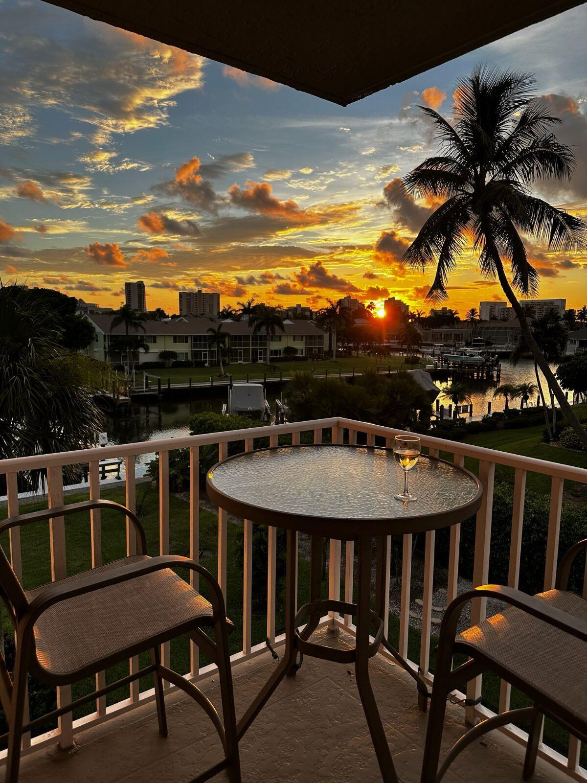 a view of a chairs and table on the terrace