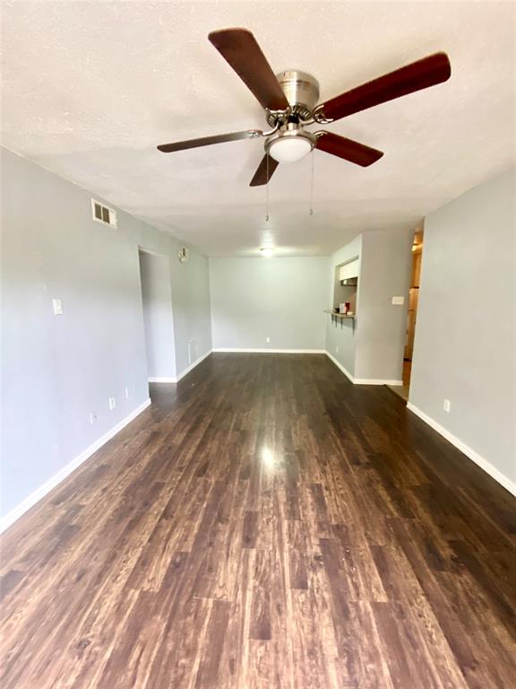 a view of a big room with wooden floor