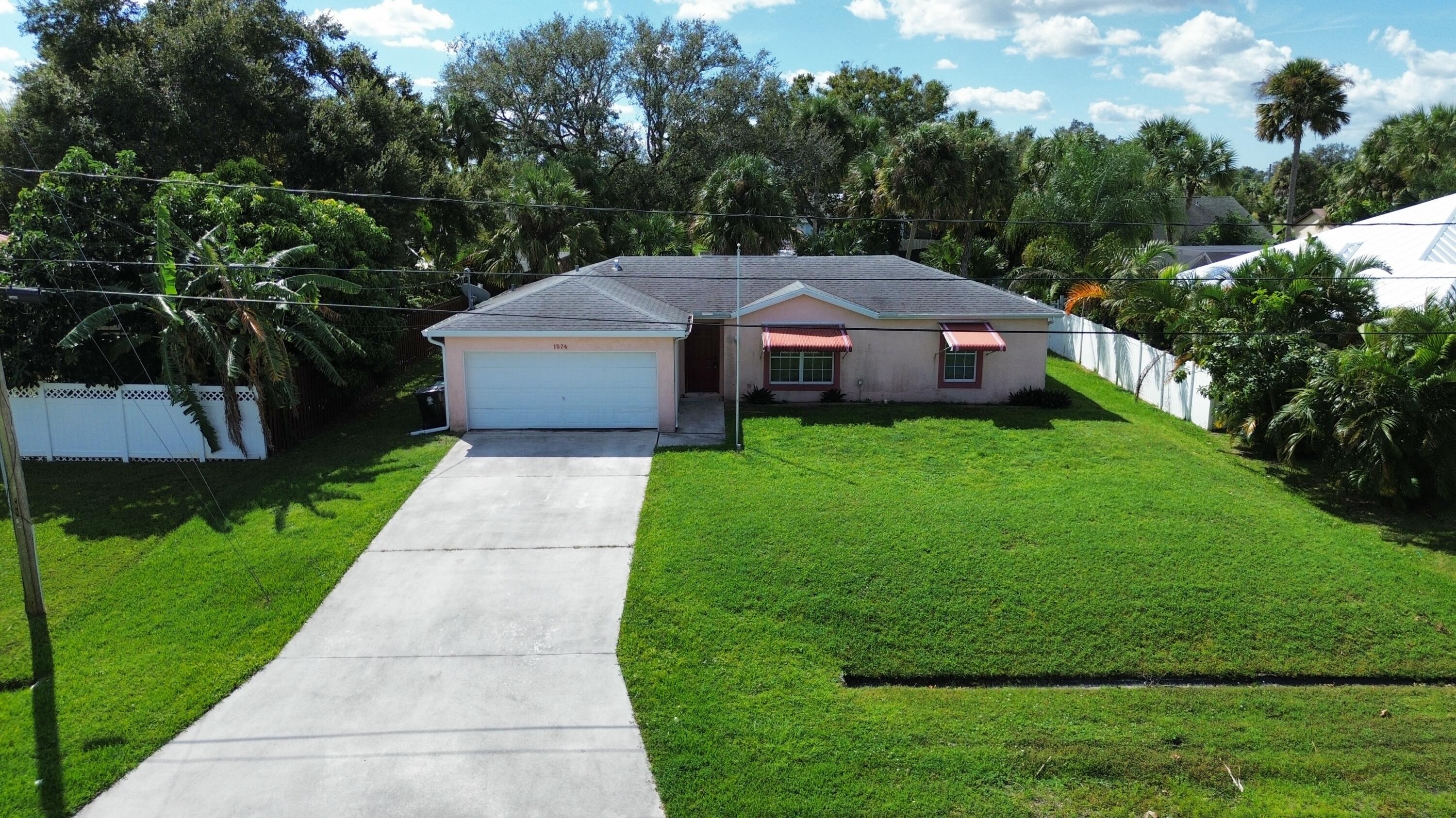 a aerial view of a house with garden