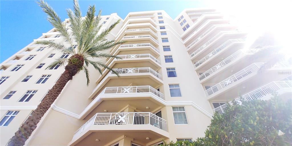 a front view of a multi story residential apartment building