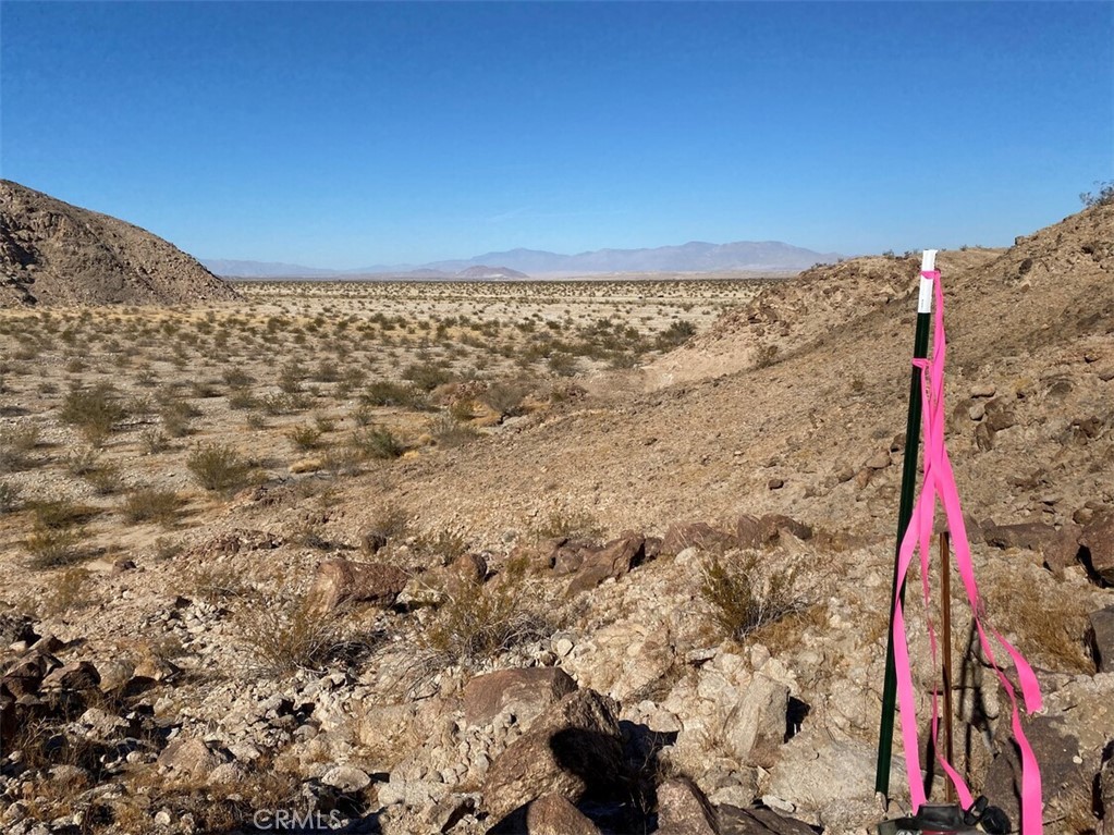 a view of mountains and valleys