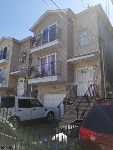 a front view of a house with balcony