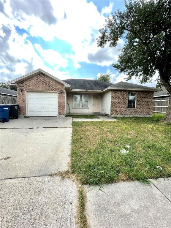 a front view of house with yard