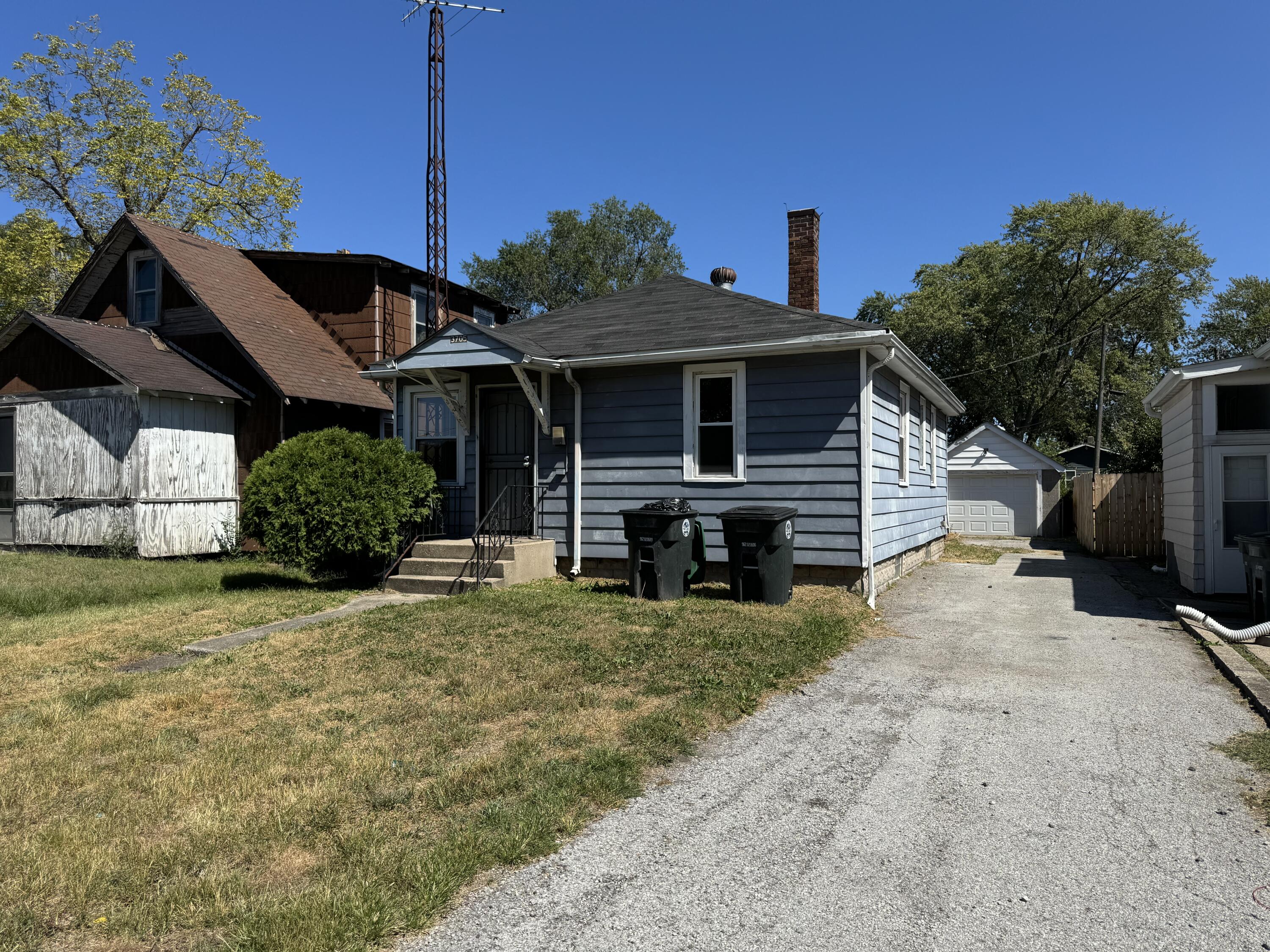 a view of a house with a patio