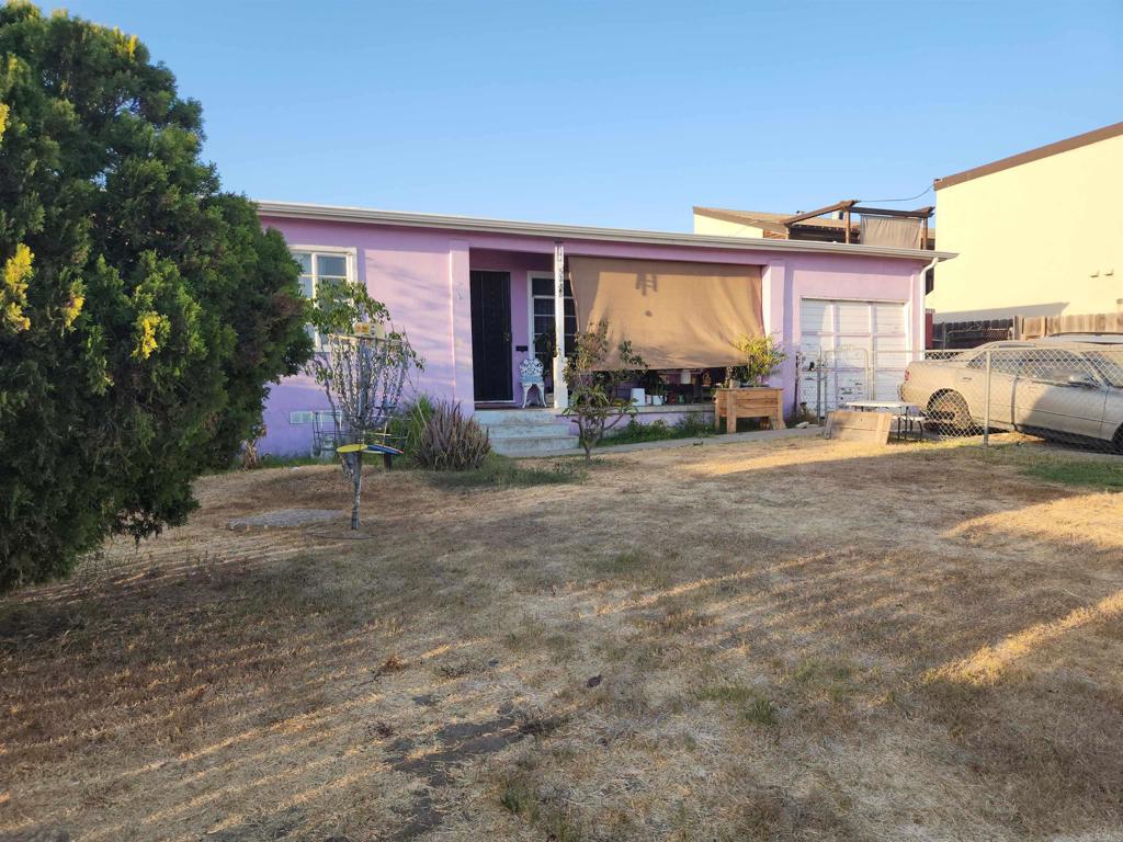 a view of a house with outdoor space and porch