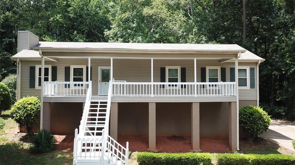 a view of a house with a porch