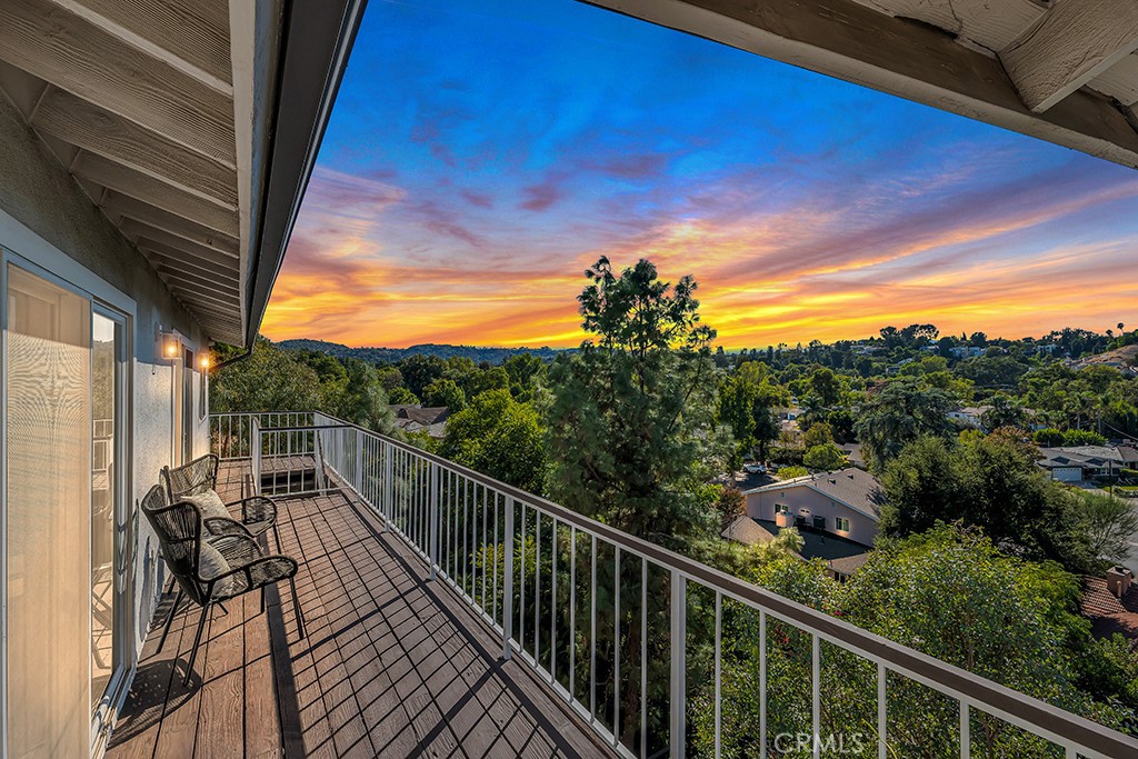 a view of a balcony with couches