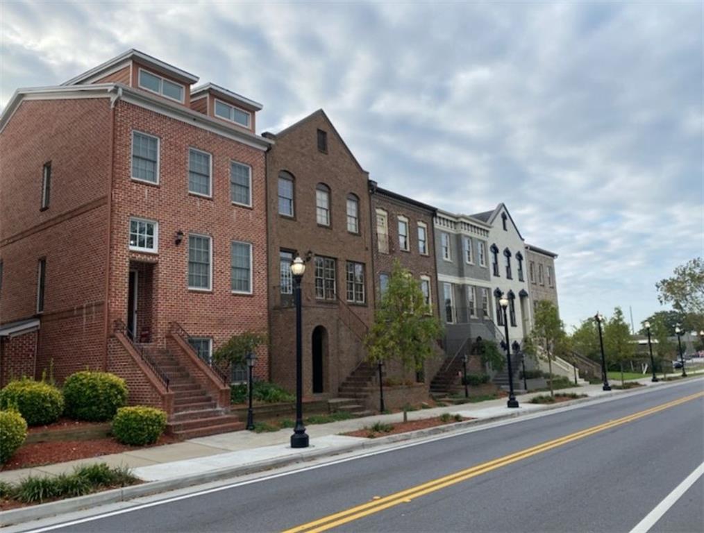 a view of a building along the street