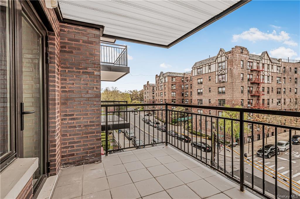 a view of a balcony with city view