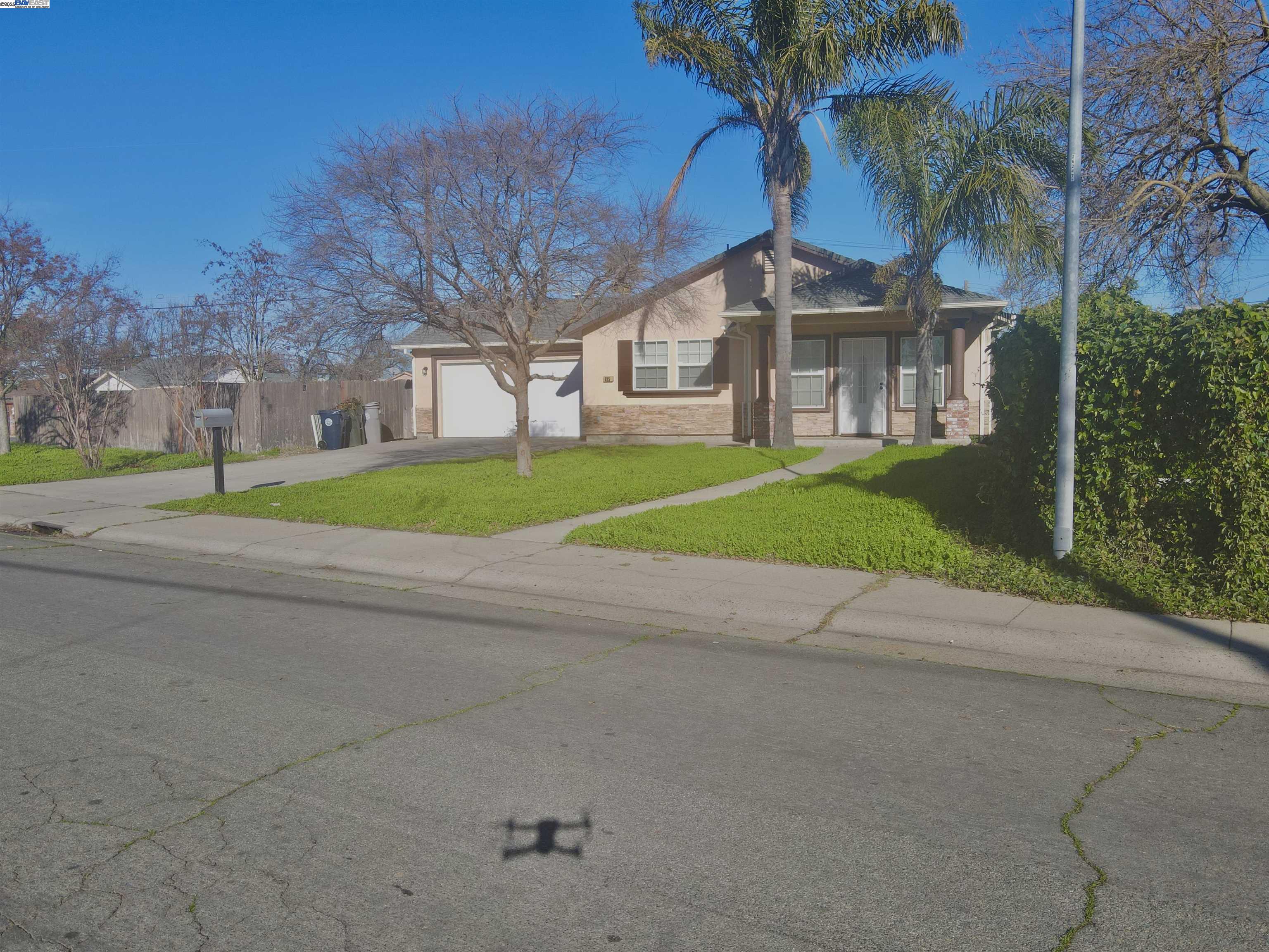 a view of a house with a street