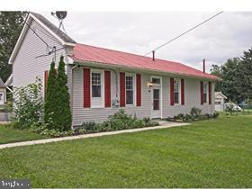 a view of a house with a garden