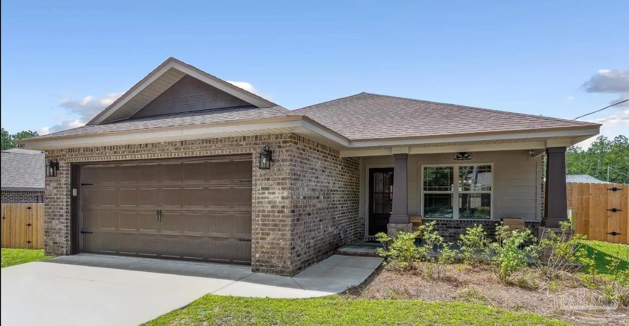 a front view of a house with yard