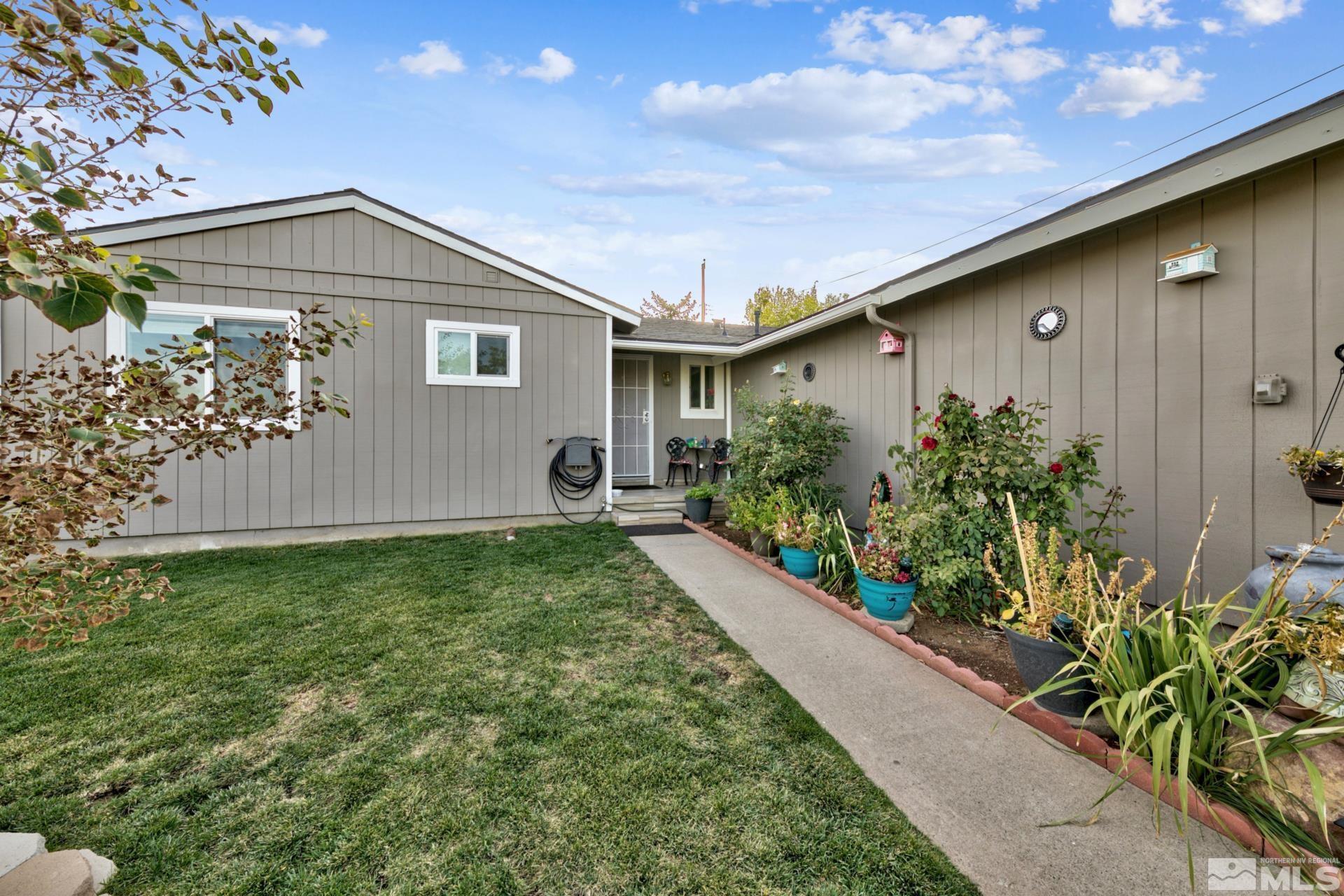 a house view with a garden space