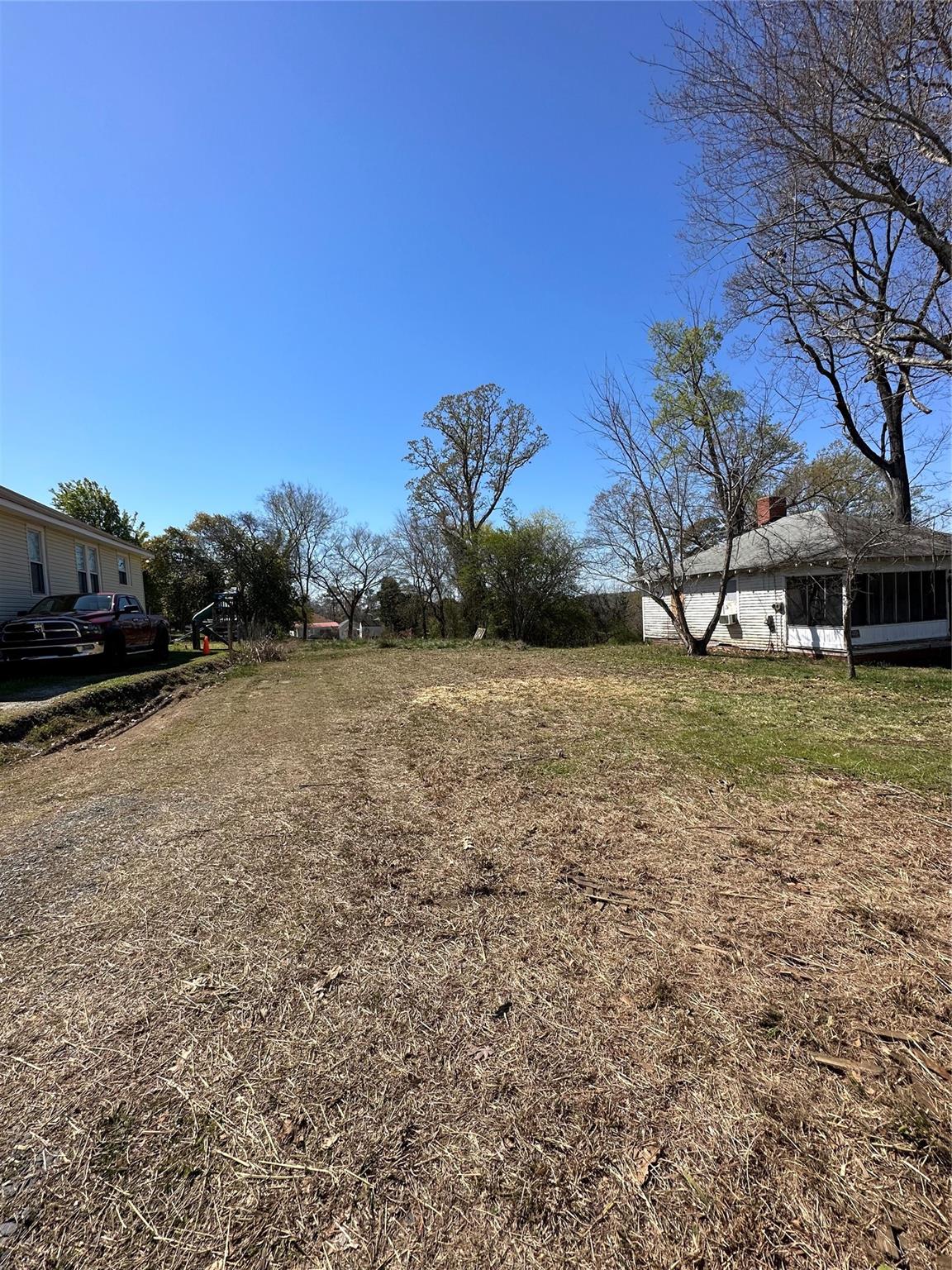 a view of a yard with an outdoor space