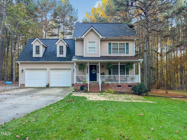 $389,000 | 4119 Tall Pine Drive | Brassfield Woods