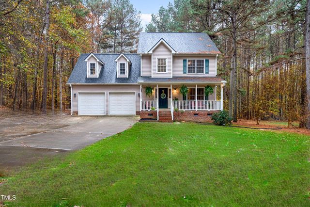 $389,000 | 4119 Tall Pine Drive | Brassfield Woods