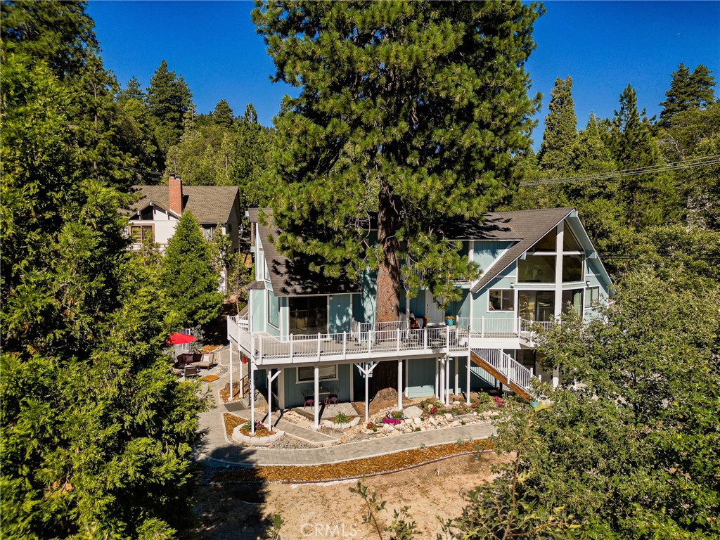 a house with trees in front of it