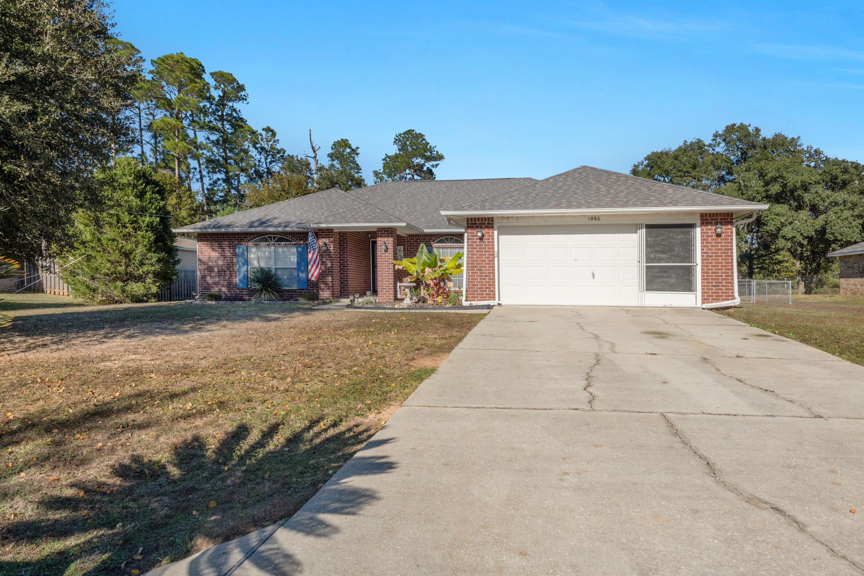 front view of a house with a yard