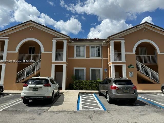 a car parked in front of a house