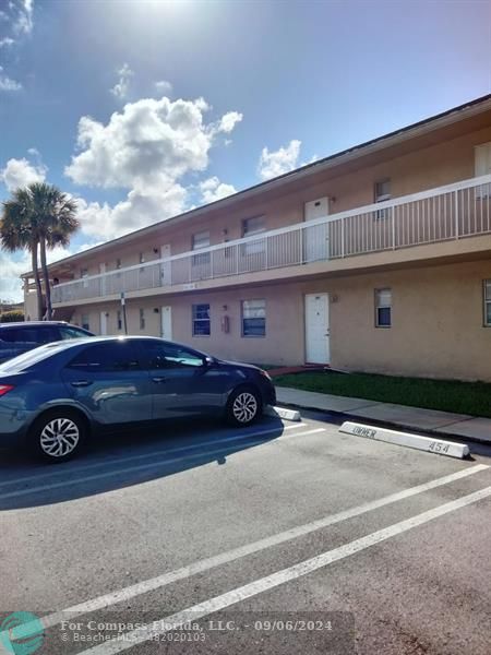 a car parked in front of a building