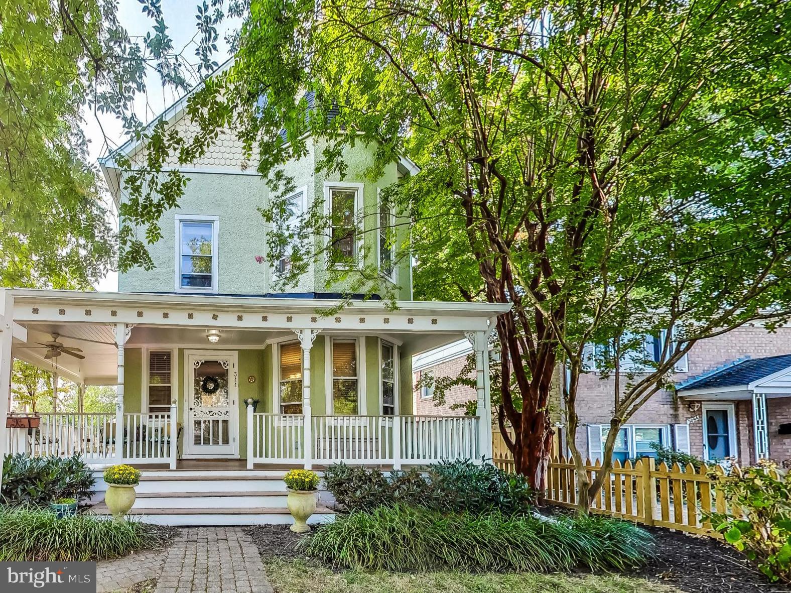 front view of a house with a garden