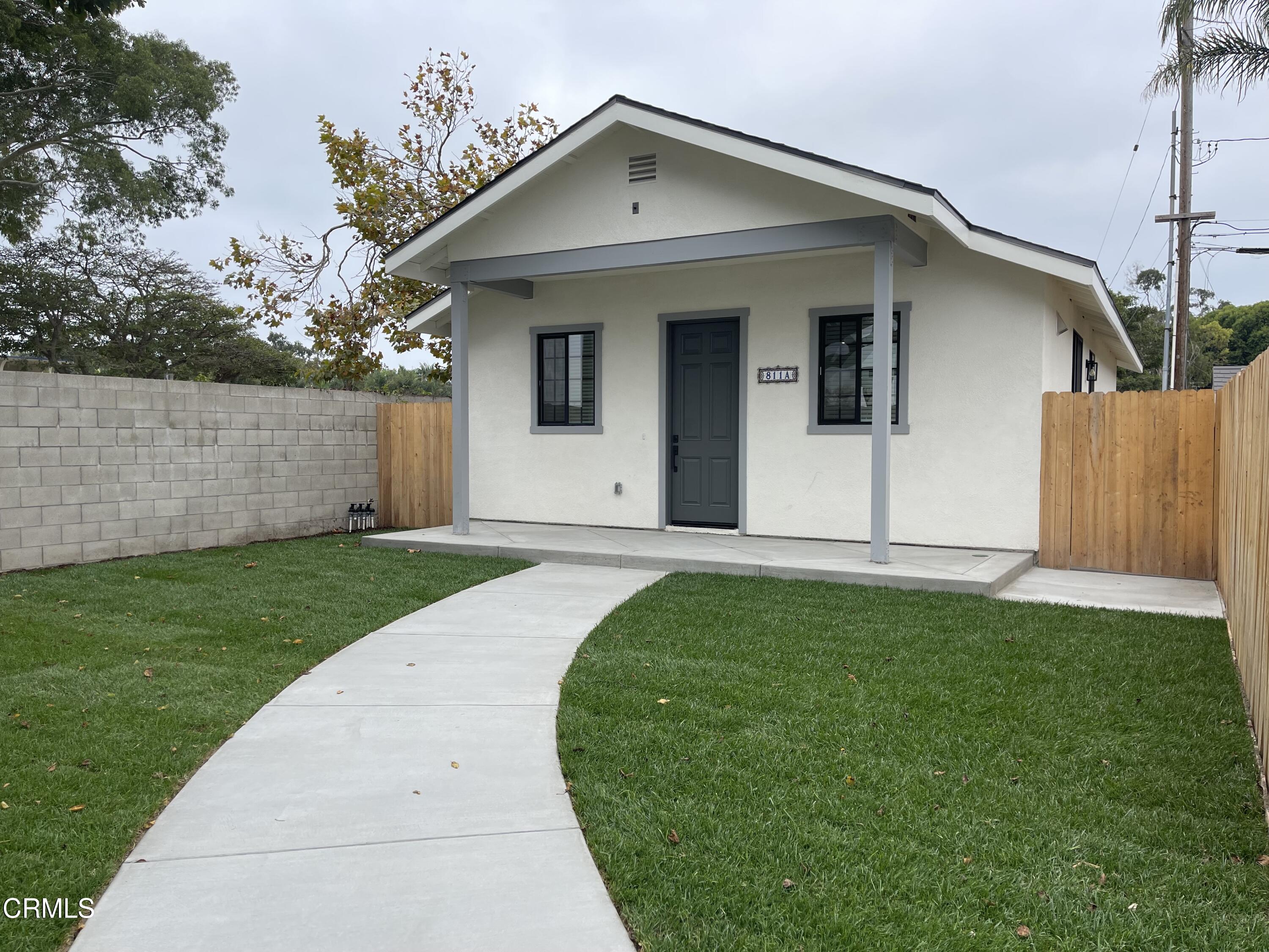 a front view of house with yard