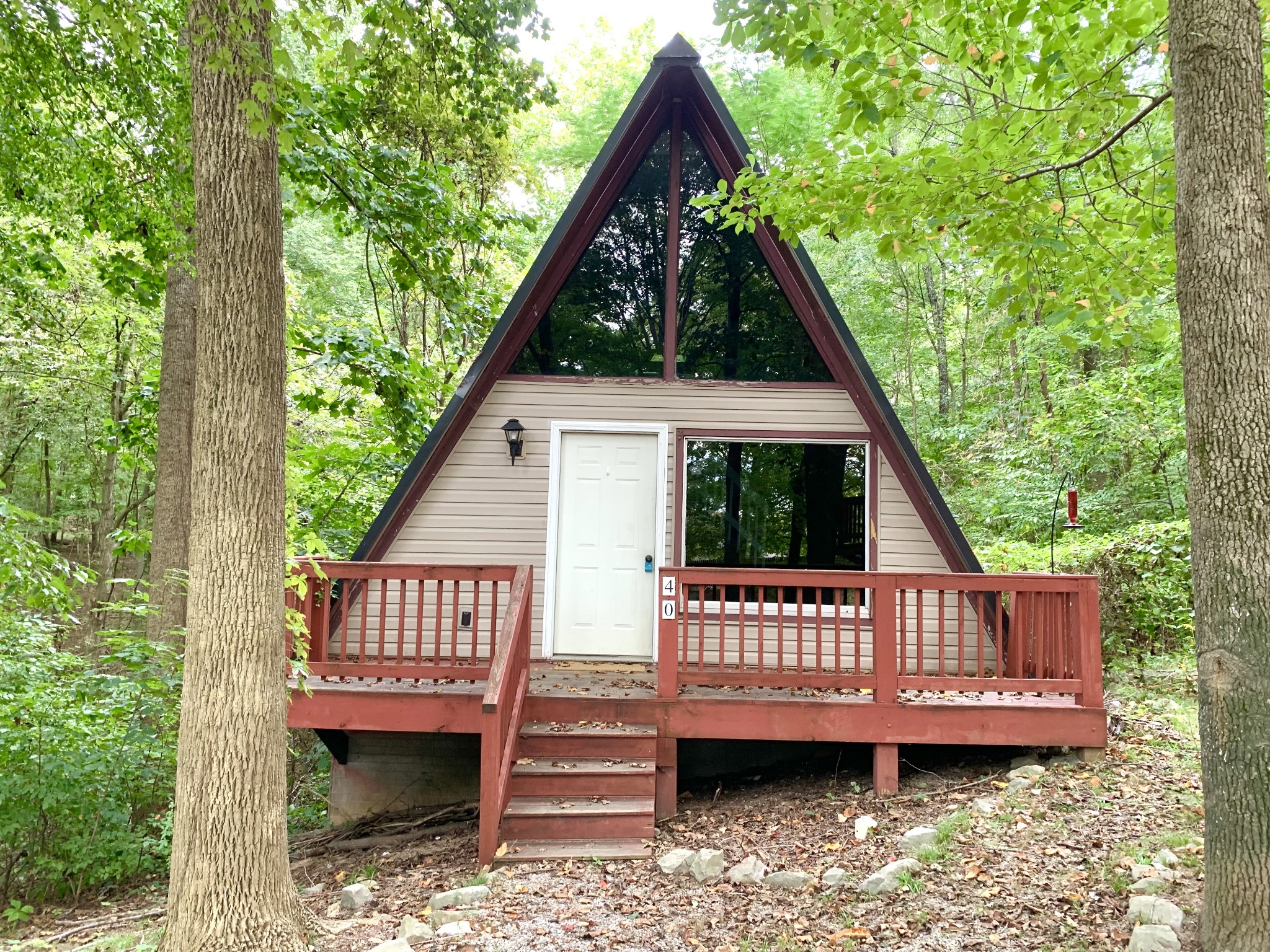 a view of a deck with a wooden deck and furniture