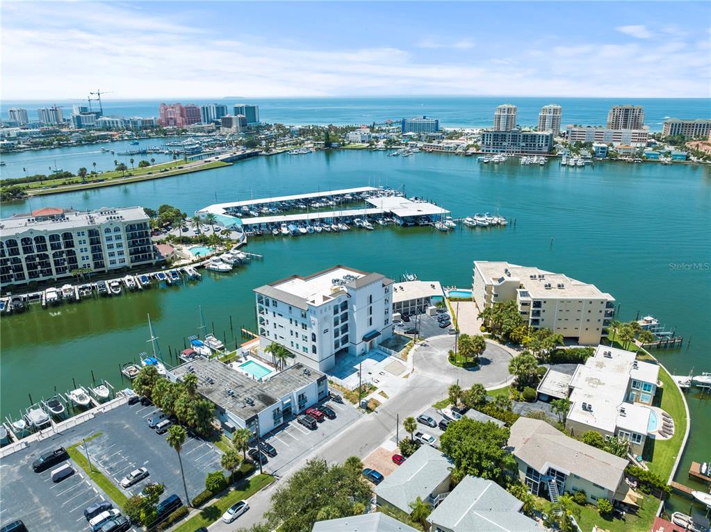 an aerial view of a city with lake view