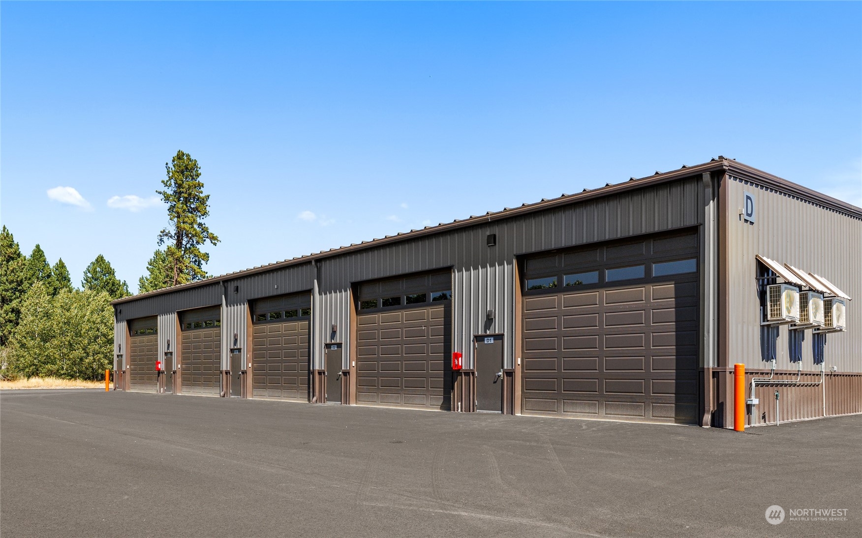 a front view of a house with a garage