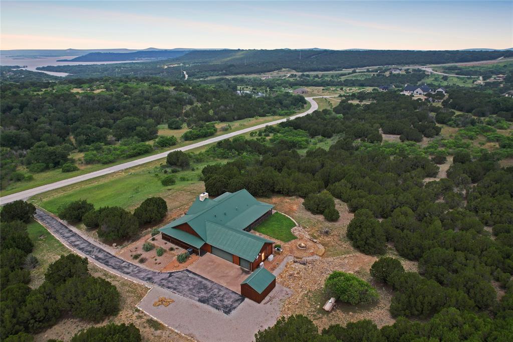 an aerial view of a house with a garden